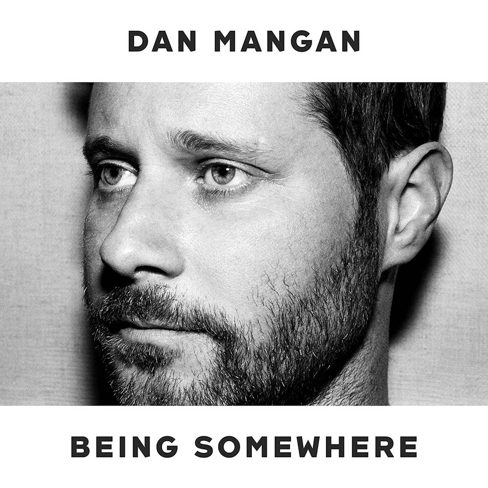 the album cover for Dan Mangan - Being Somewhere