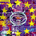 the album cover for U2 - Zooropa: Remastered [Limited Edition Blue LP]