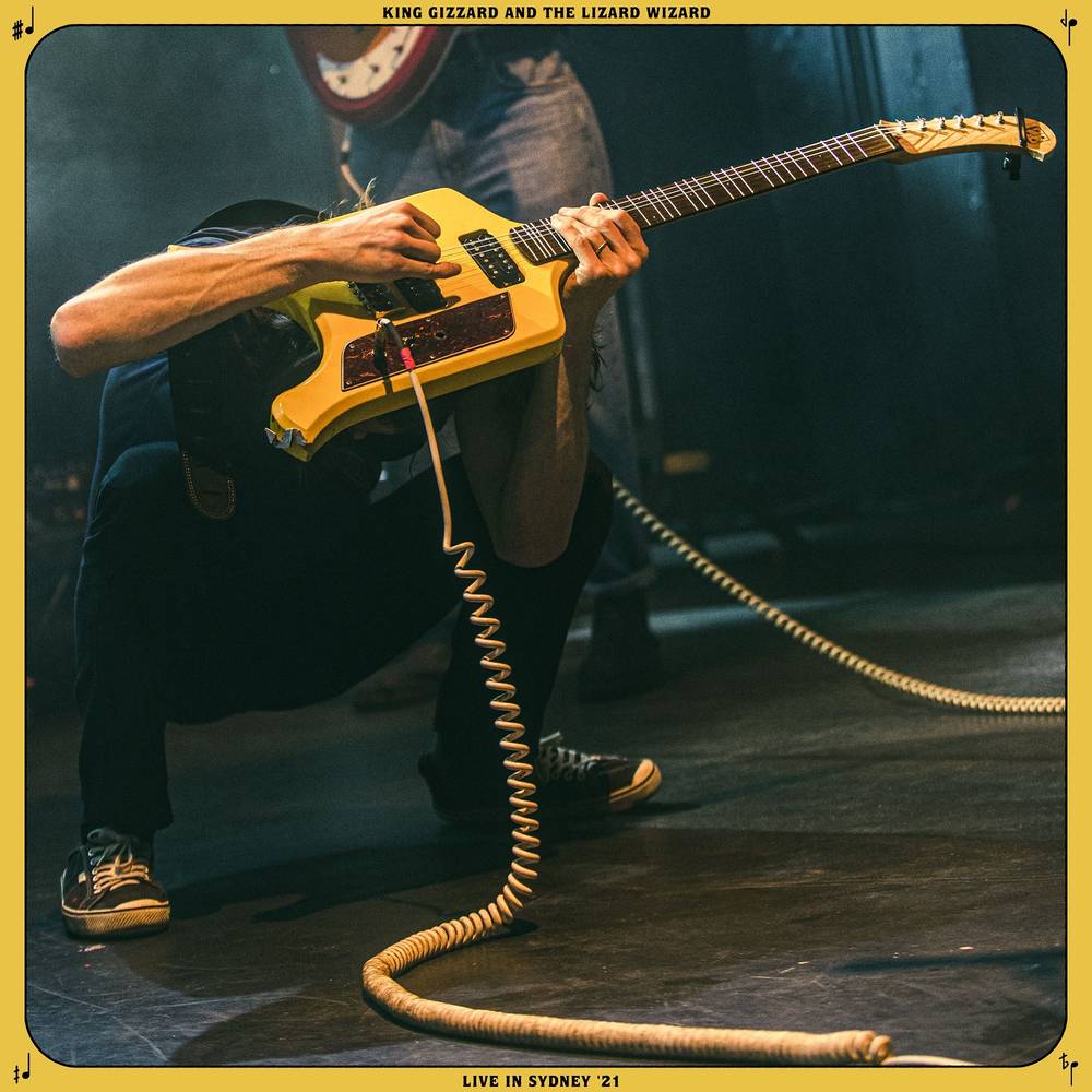 the album cover for King Gizzard & The Lizard Wizard - Live in Sydney '21 [Indie Exclusive Limited Edition Nuclear Fusion Yellow Triple Button 2 LP]
