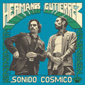 the album cover for Hermanos Gutierrez - Sonido Cosmico [Indie Exclusive Limited Edition Blue/Green Splatter LP]