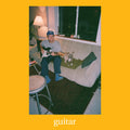 the album cover for Mac DeMarco - Guitar [Indie Exclusive Transparent Orange Vinyl]