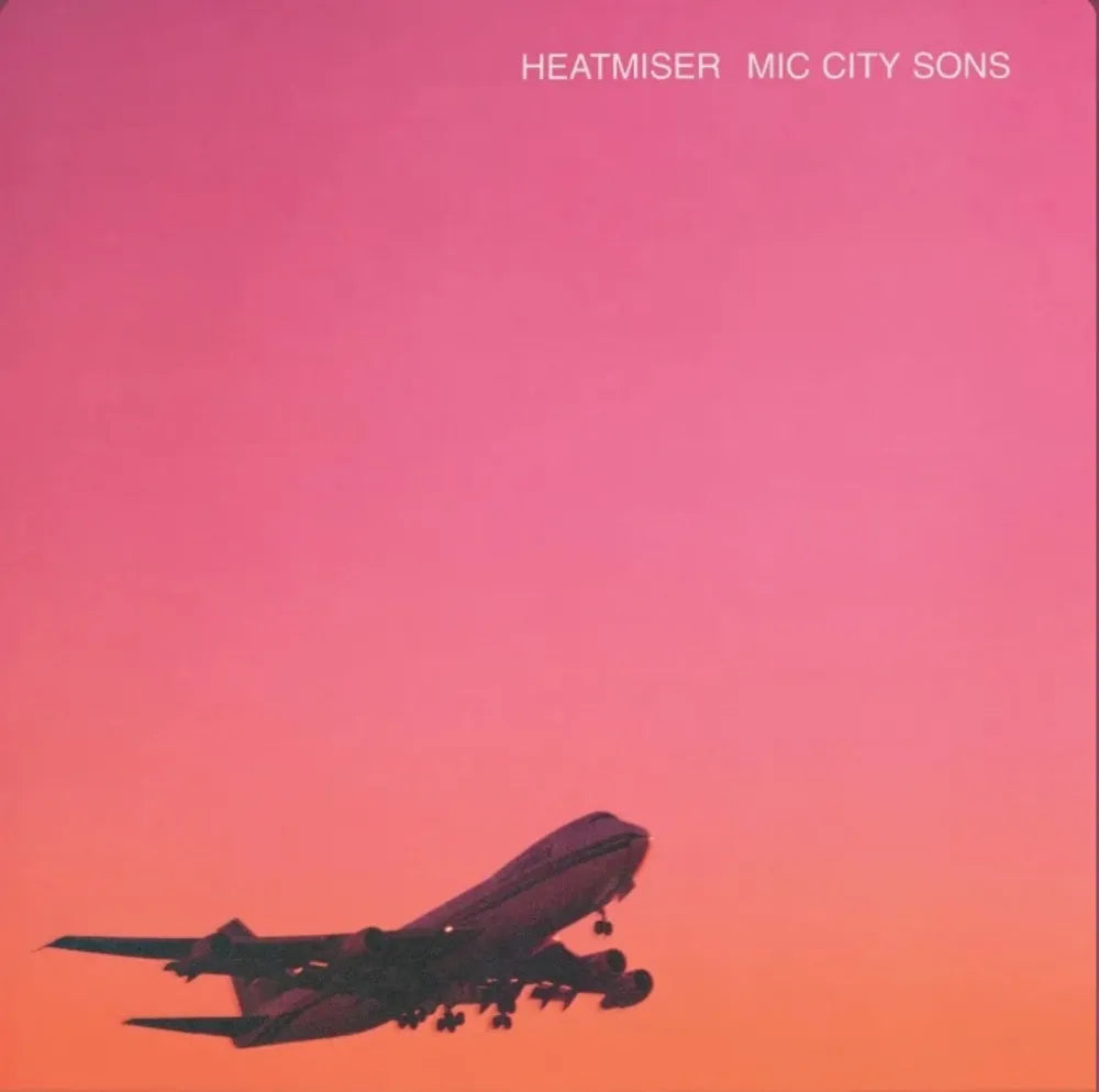 the album cover for Heatmiser - Mic City Sons - 30th Anniversary  [2LP Limited Edition Sunset Pink Transparent & Starry Night Blue Glitter]