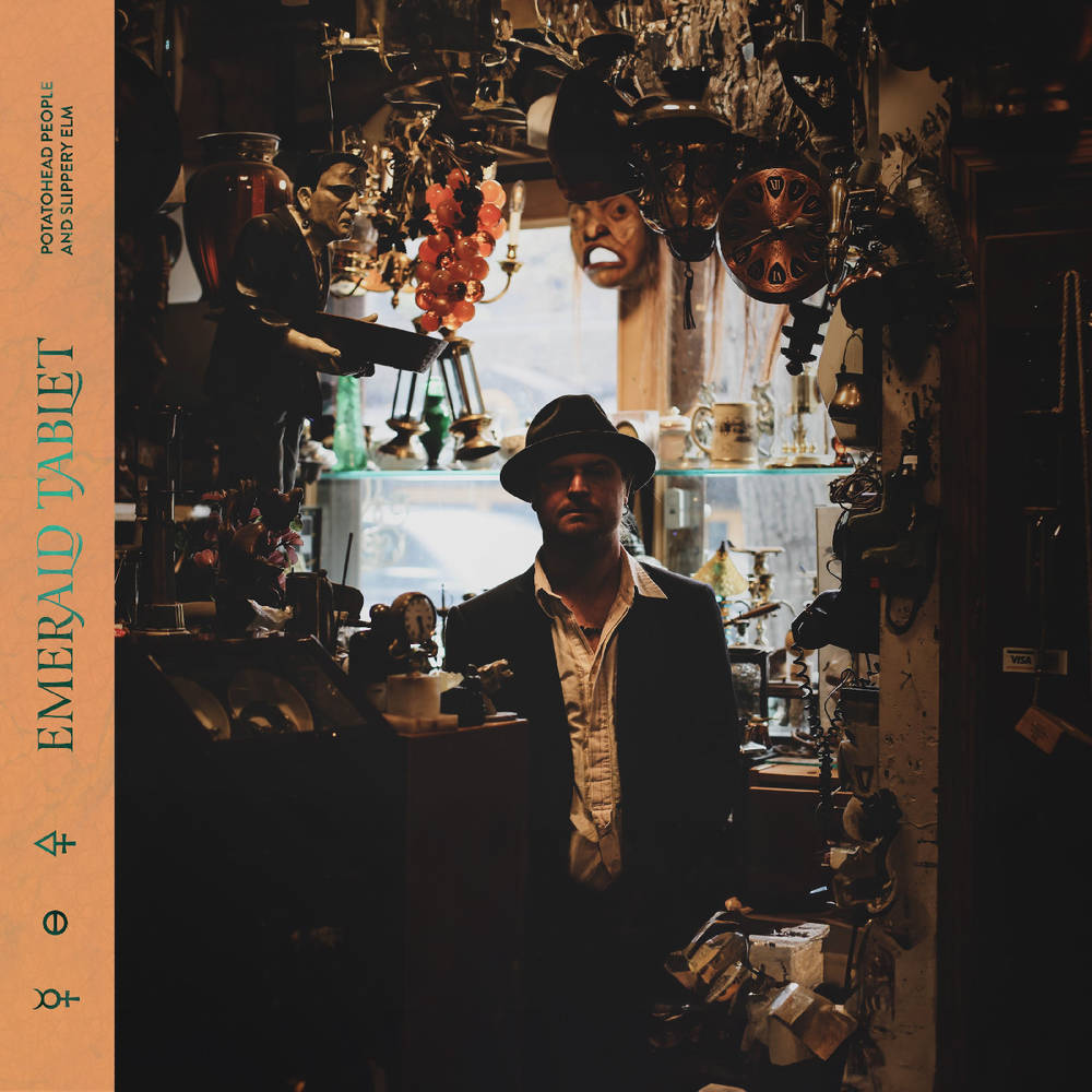 the album cover for Potatohead People / Slippery Elm - Emerald Tablet