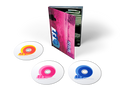 the album cover for R.E.M. - Reveal - 25th Anniversary Edition [2 CD + BR * hardbound book]