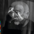 the album cover for Peter Gabriel - o\i [Indie Exclusive Dark-Side Mix Neon Purple]
