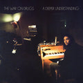the album cover for The War On Drugs - A Deeper Understanding: Deluxe [Limited Edition Translucent Tangerine 2LP]