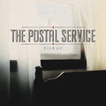 the album cover for The Postal Service - Give Up: 20th Anniversary Edition [Limited Edition Blue W/ Metallic Silver LP]