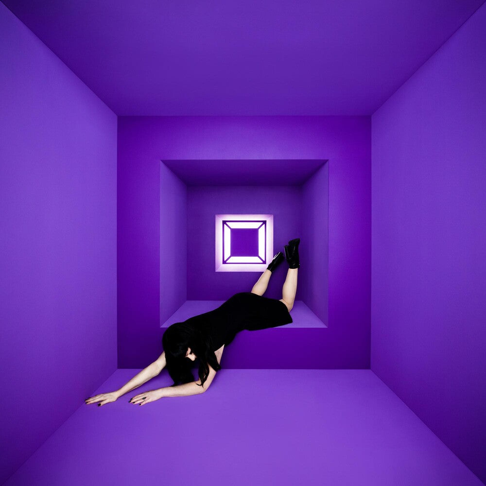 the album cover for Olivia Jean - Raving Ghost [Indie Exclusive Limited Edition Phantom Amethyst LP]
