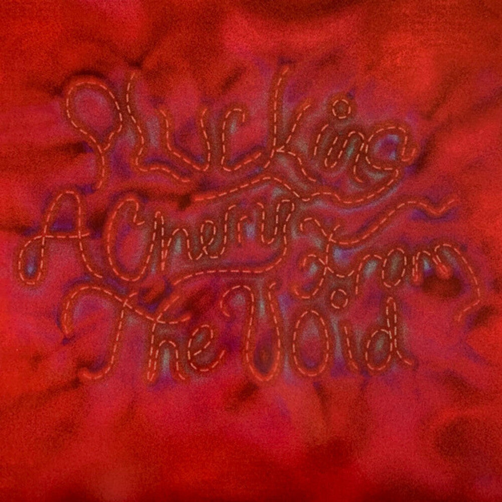 the album cover for Cecile Believe - Plucking A Cherry From The Void - Clear [Clear Vinyl]