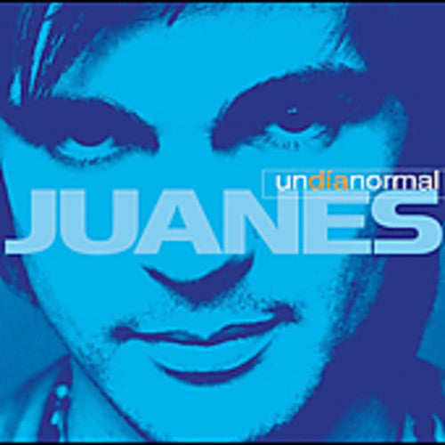 the album cover for Juanes - Un Dia Normal