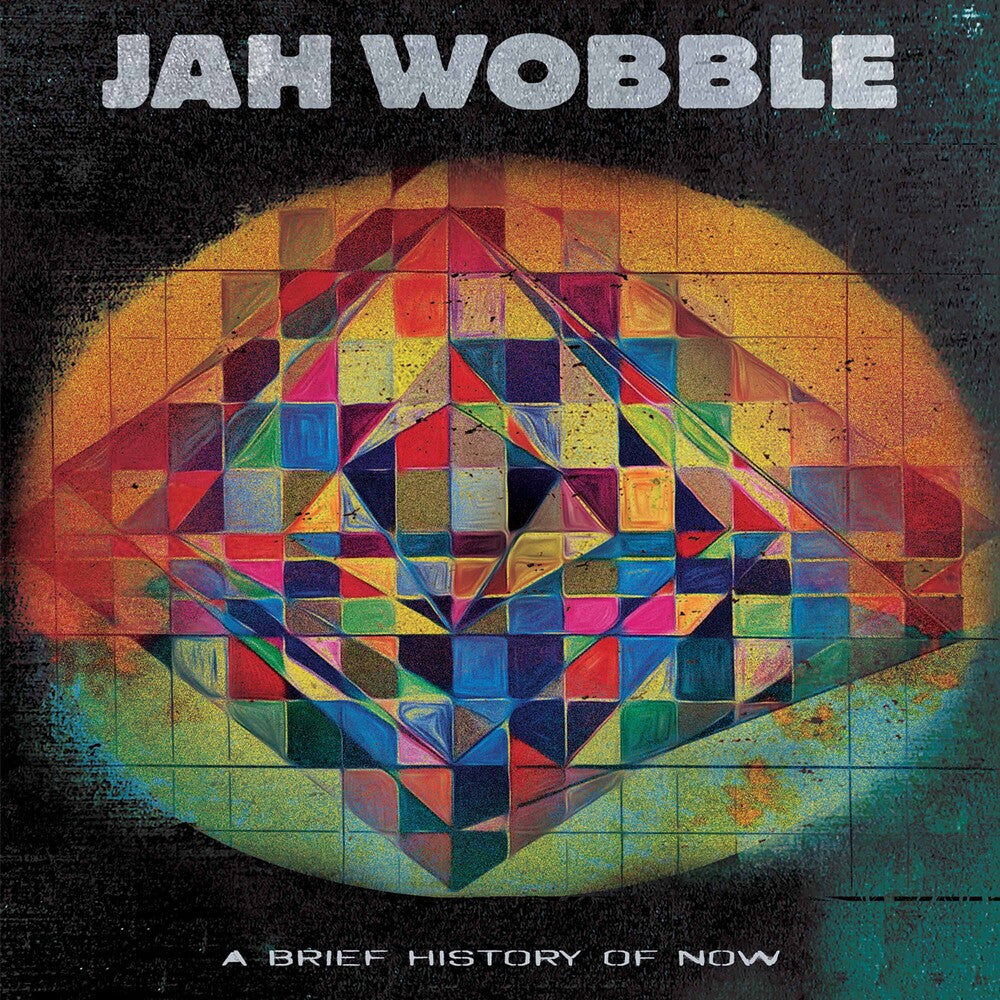 the album cover for Jah Wobble - Brief History Of Now - Red/Black/Yellow Splatter