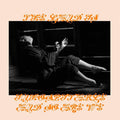 the album cover for Mitski - The Land Is Inhospitable and So Are We [Indie Exclusive Limited Edition Robin Egg Blue LP w/ Baby Pink Slipcase]