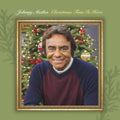 the album cover for Johnny Mathis - Christmas Time Is Here [Colored Vinyl] (Grn) [Limited Edition]
