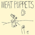 the album cover for Meat Puppets - In A Car: Remastered [LP]