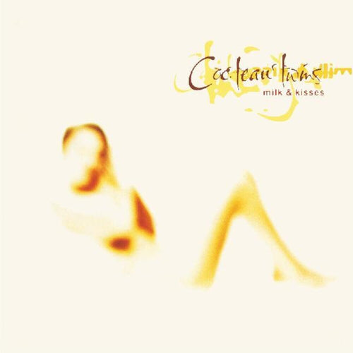 the album cover for Cocteau Twins - Milk & Kisses
