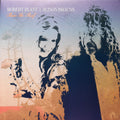 the album cover for Robert Plant & Alison Krauss - Raise The Roof [Coke Bottle Clear 2 LP]