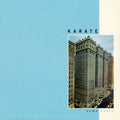 the album cover for Karate - Some Boots [Transparent Light Blue & Grey LP]