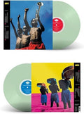 the album cover for Common - A Beautiful Revolution Pt 1 & 2 [Deluxe Edition Coke Bottle Clear 2LP]