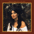 the album cover for Emmylou Harris - Roses in the Snow