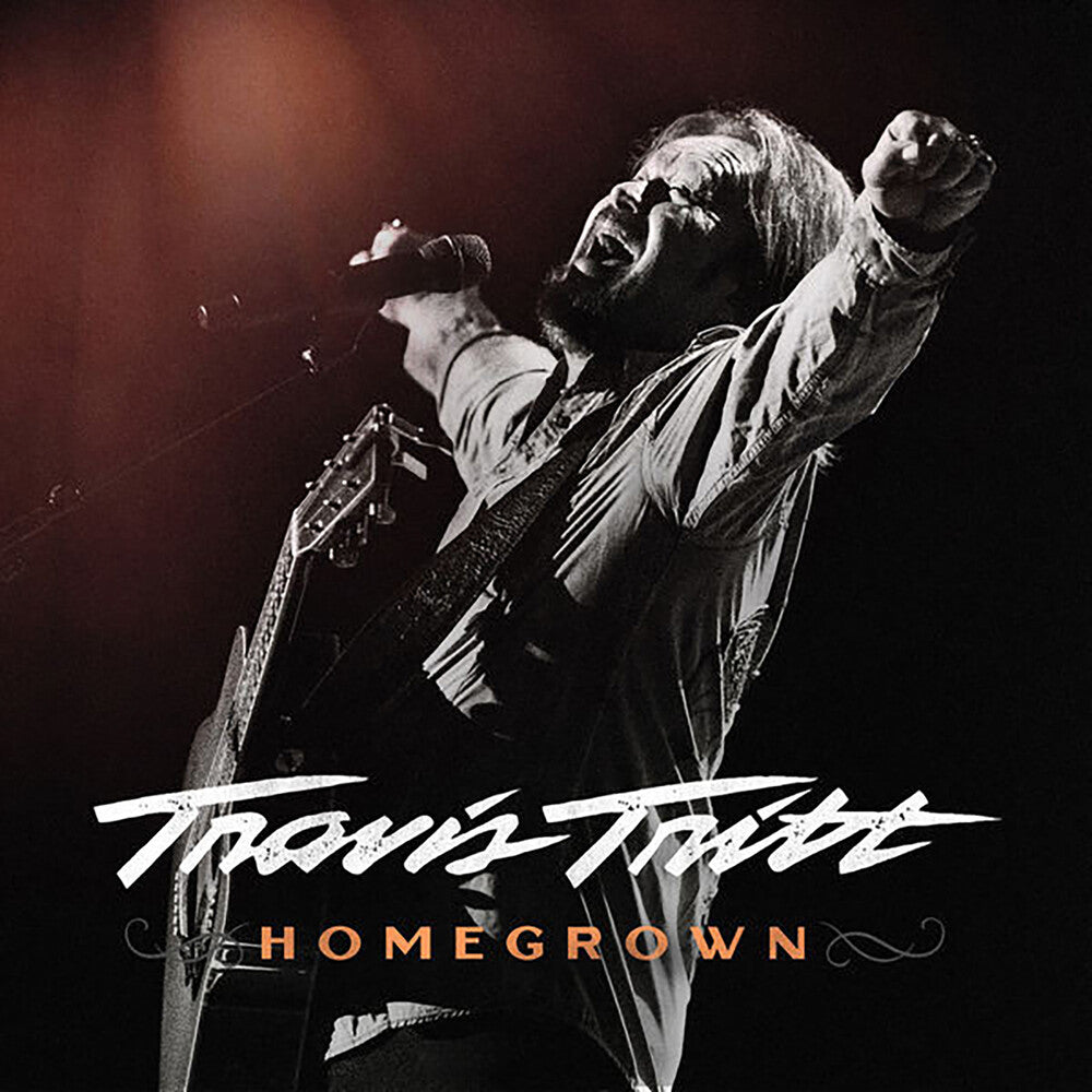 the album cover for Travis Tritt - Homegrown [Digipak] [Reissue]