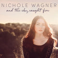 the album cover for Nichole Wagner - And The Sky Caught Fire
