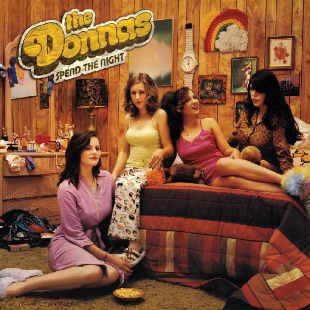 the album cover for Donnas - Spend The Night [Colored Vinyl] (Pnk)