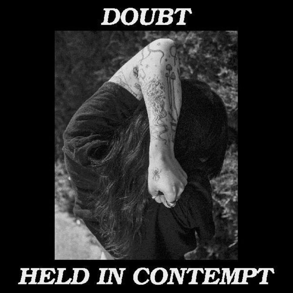 the album cover for Doubt - Held In Contempt (Post)