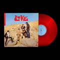the album cover for Love - Now Playing