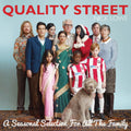 the album cover for Nick Lowe - Quality Street: A Seasonal Selection For All The