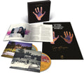 the album cover for George Harrison - Living in the Material World (50th Anniversary) -  [Deluxe 2 CD]