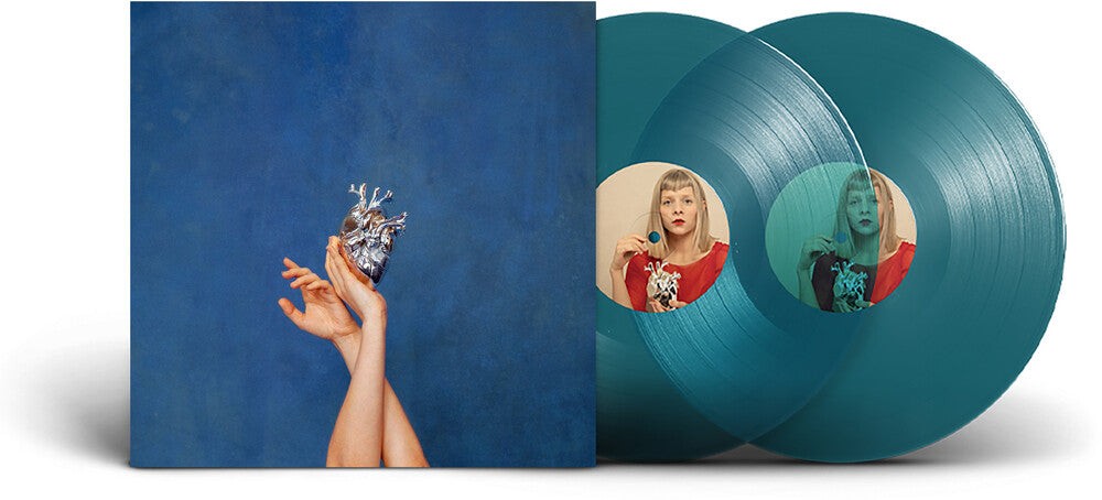the album cover for Aurora -  What Happened To The Heart? [Indie exclusive translucent sea blue LP]