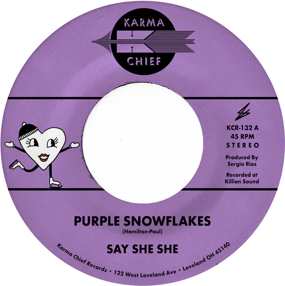 the album cover for Say She She - Purple Snowflakes / This Wintertime [Colored Vinyl] (Purp)