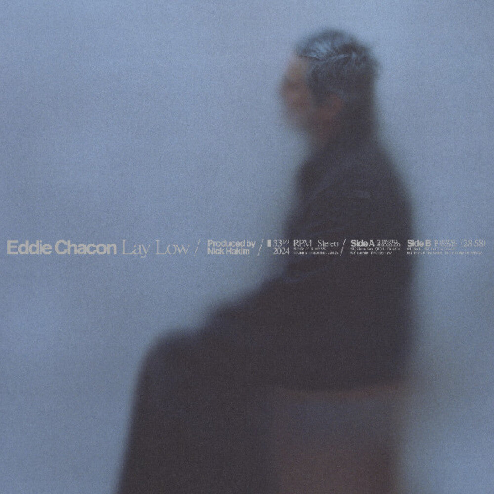 the album cover for Eddie Chacon - Lay Low (Blue) [Colored Vinyl] [Indie Exclusive] (Smok)