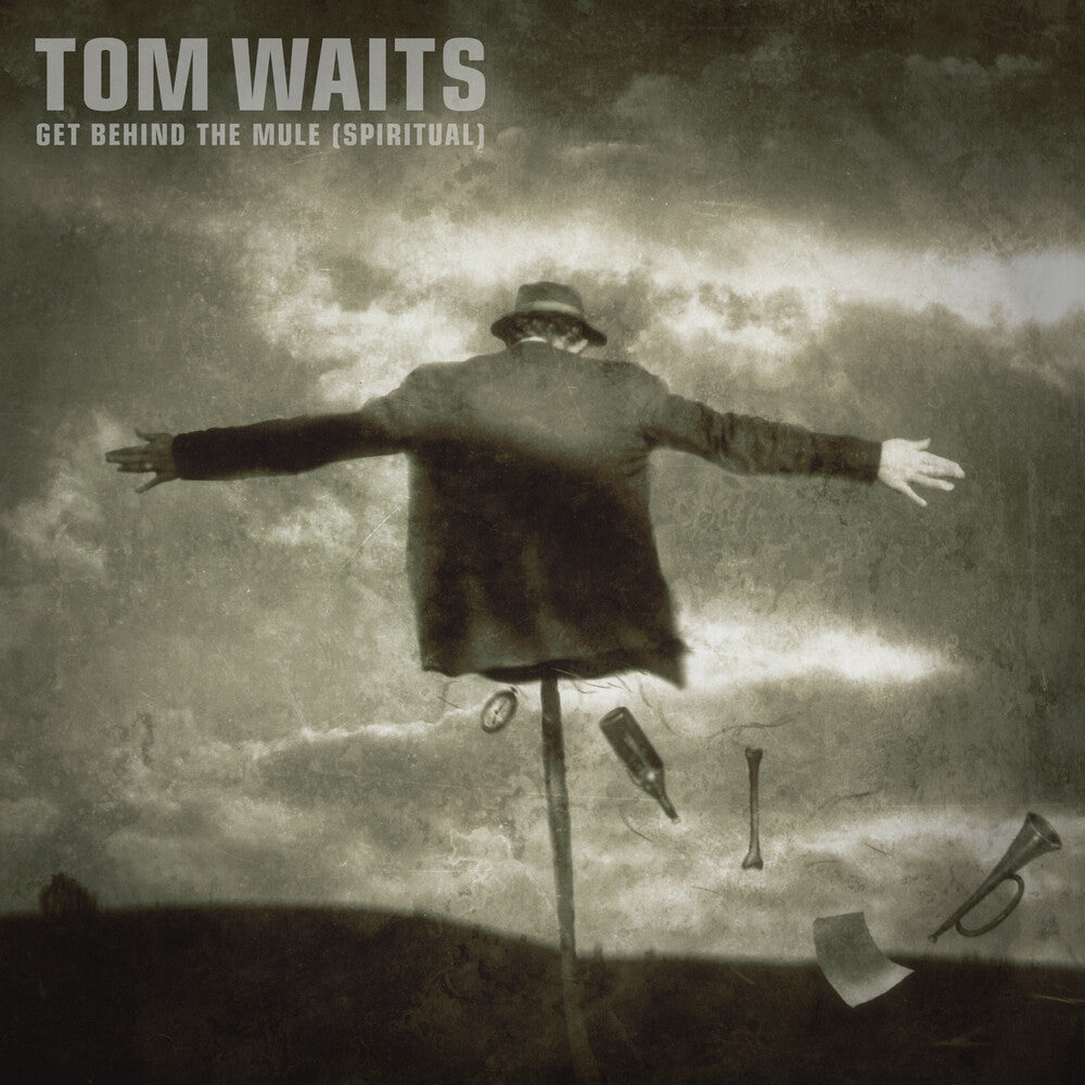 the album cover for Tom Waits - Get Behind The Mule - Spiritual (Rsd) [Record Store Day]