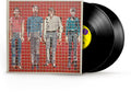 the album cover for Talking Heads - More Songs About Buildings And Food