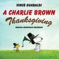 the album cover for Vince Guaraldi - A Charlie Brown Thanksgiving -  [Indie Exclusive 1LPxYellow Jelly Bean]