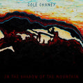 the album cover for Cole Chaney - In The Shadow Of The Mountain