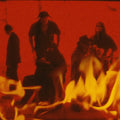 the album cover for Poison Idea - We Must Burn [Colored Vinyl] (Org) (Phot)