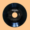 the album cover for Budos Band - Escape From Ptenoda City / Behind the Black Curtain (random Color 7inch)