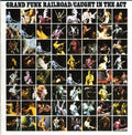 the album cover for Grand Funk Railroad - Caught in the Act