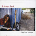 the album cover for Robben Ford - Keep on Running