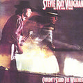 the album cover for Stevie Vaughan Ray, & Double Trouble - Couldn't Stand Weather