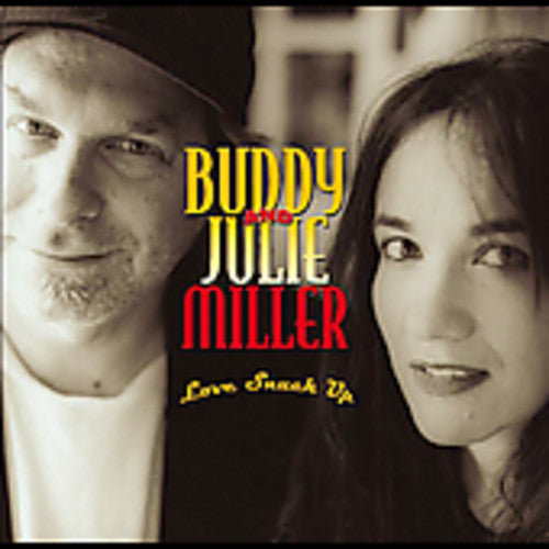 the album cover for Buddy & Julie Miller - Love Snuck Up