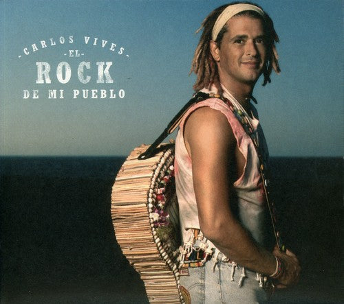 the album cover for Carlos Vives - El Rock De Mi Pueblo