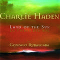 the album cover for Charlie Haden - Land of the Sun