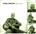 the album cover for Larry Carlton - Fire Wire