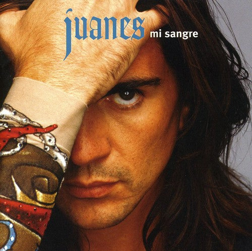 the album cover for Juanes - Mi Sangre