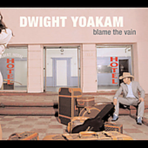 the album cover for Dwight Yoakam - Blame the Vain