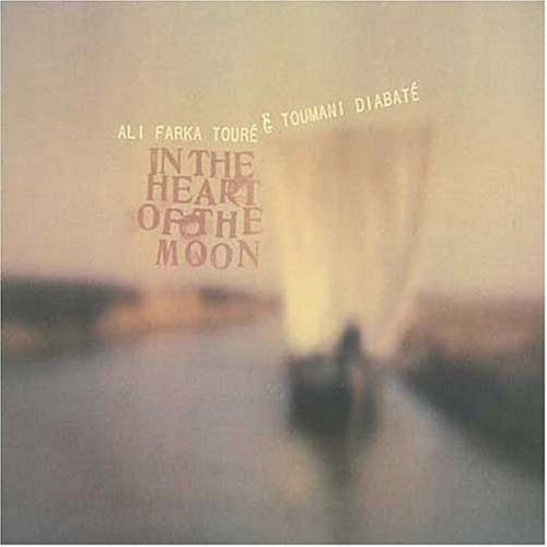 the album cover for Ali Toure Farka & Toumani Diabate - In The Heart Of The Moon