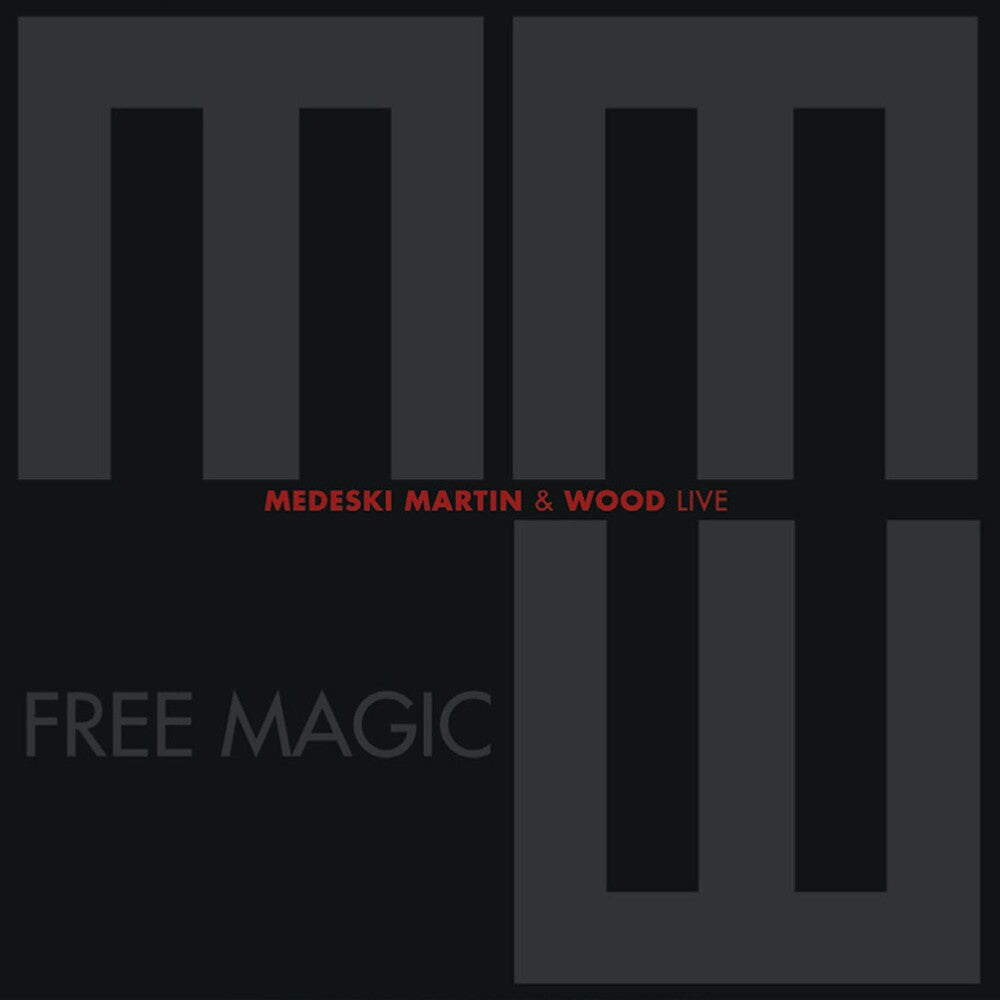 the album cover for Medeski, Martin & Wood - Free Magic